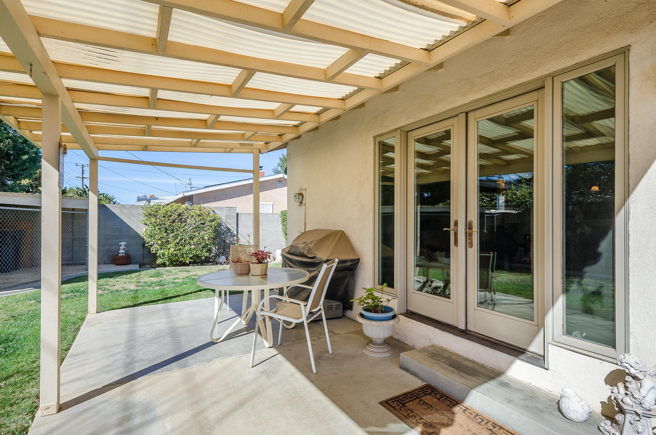 519 North Bradley Road Santa Maria, CA 93454 - Photo 23 of 27 a patio with yard glass top table and chairs