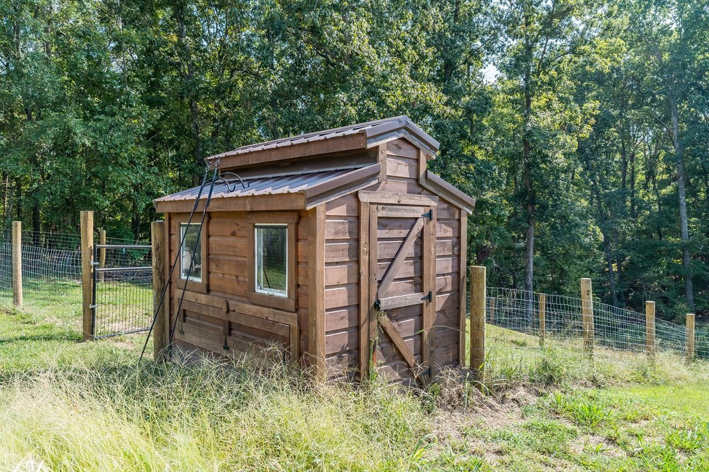 14396 S Road Cadiz, KY 42211 - Photo 12 of 15 a backyard of a house with lots of green space