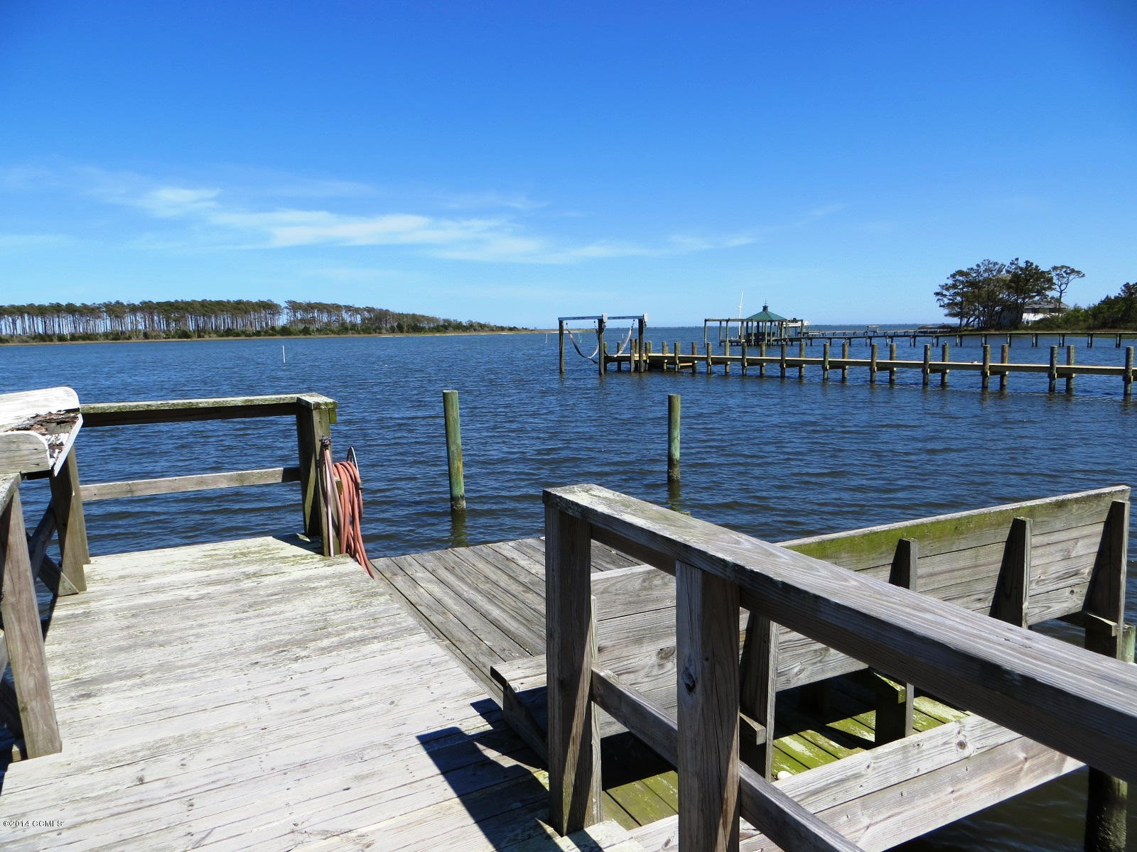 156 Taylor Road Marshallberg, NC 28553 - Photo 38 of 54 Dock with seating and fish cleaning stat