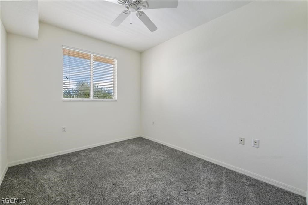 8261 Pathfinder Loop, Unit 738 Fort Myers, FL 33919 - Photo 13 of 22 an empty room with a window