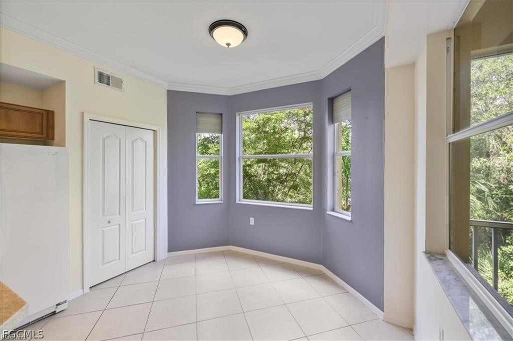 8261 Pathfinder Loop, Unit 738 Fort Myers, FL 33919 - Photo 9 of 22 a view of an empty room with a window