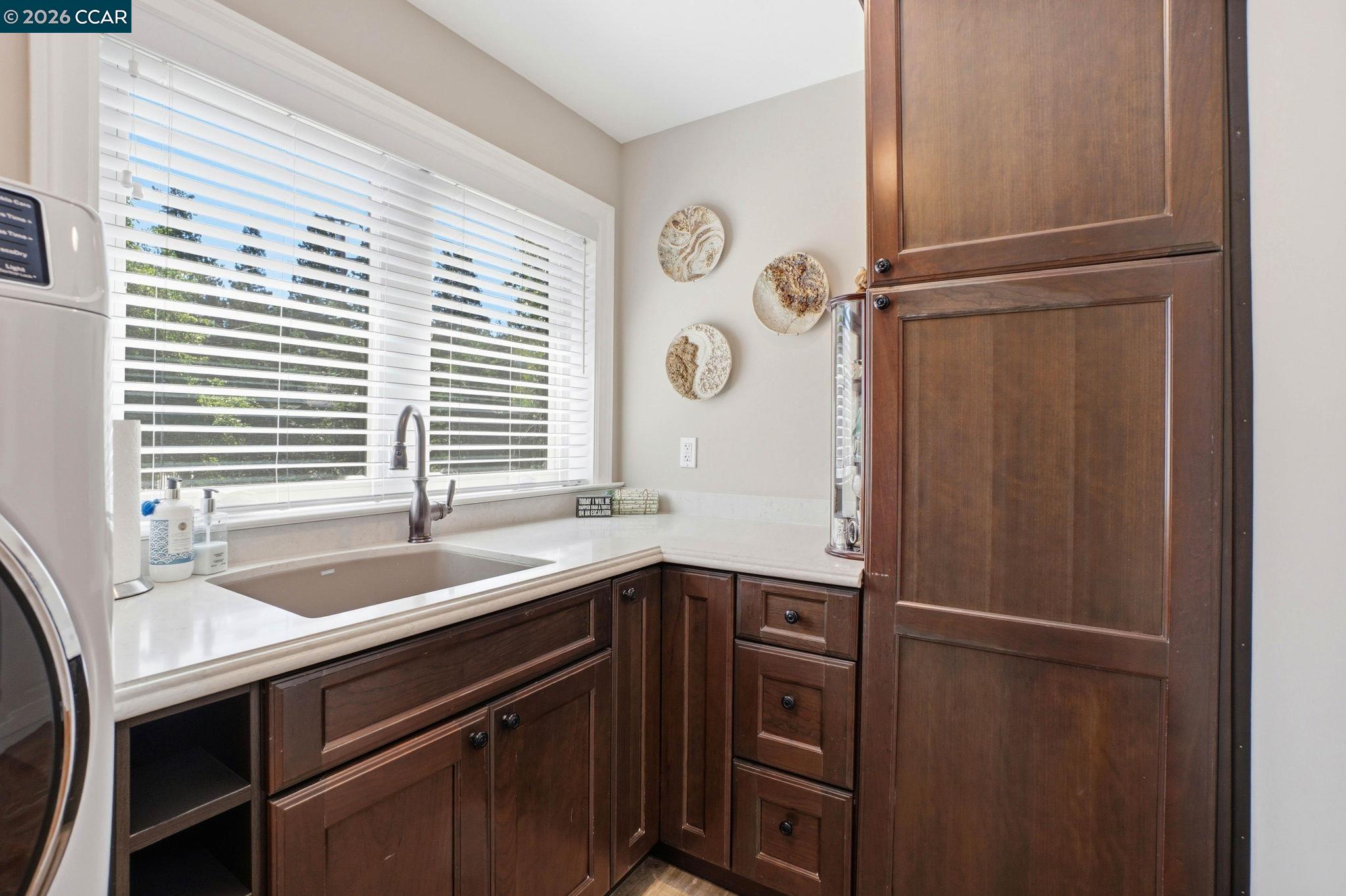 8 Simo Street Alamo, CA 94507 - Photo 27 of 41 Built-in linen cupboard and sink. Washer & Dryer included in sale