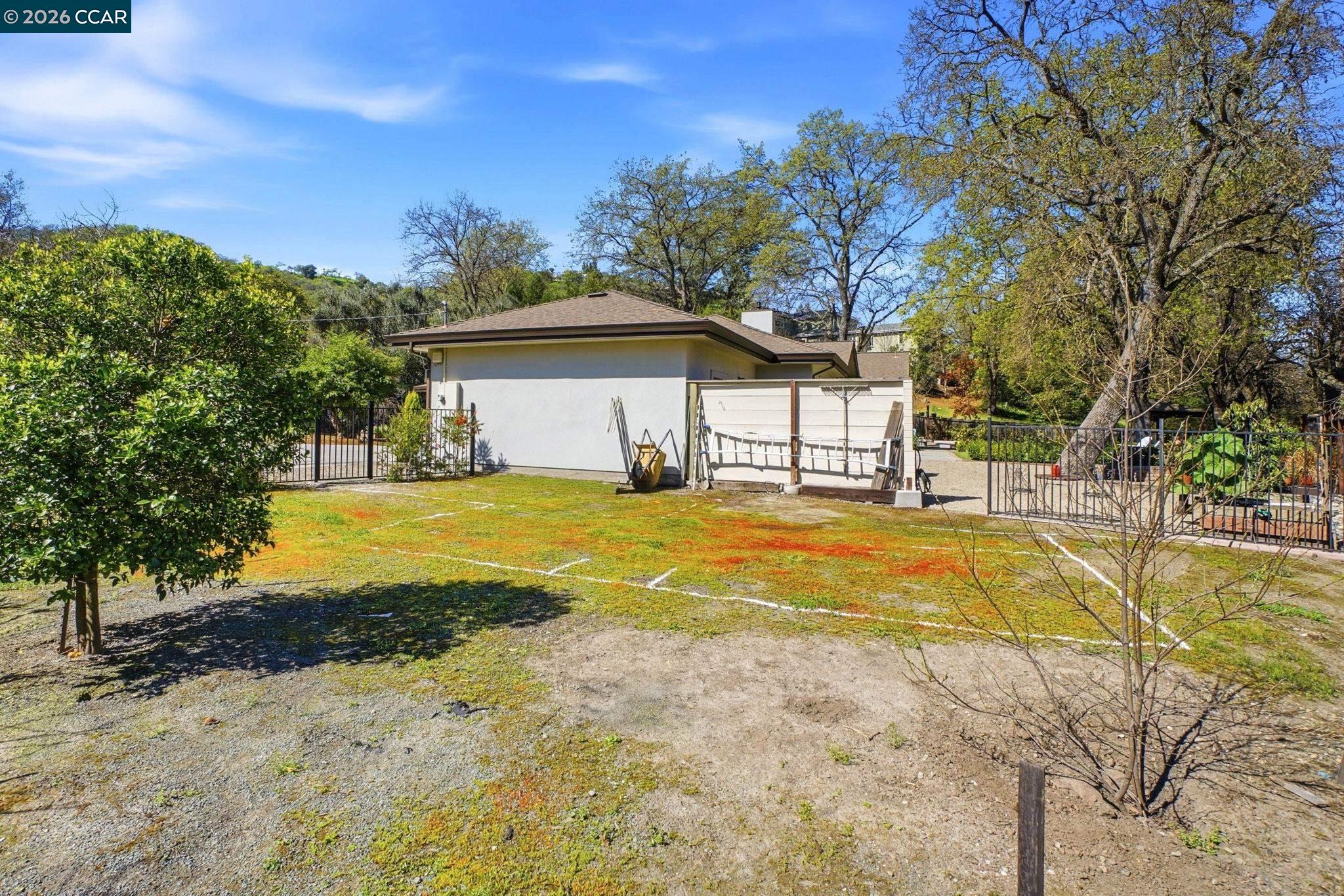 8 Simo Street Alamo, CA 94507 - Photo 39 of 41 Side yard for possible 3rd car attached garage, ADU location. Inc. plan for 650+/-sf, 2 bedroom, living, kitchen, bath ADU with private access.