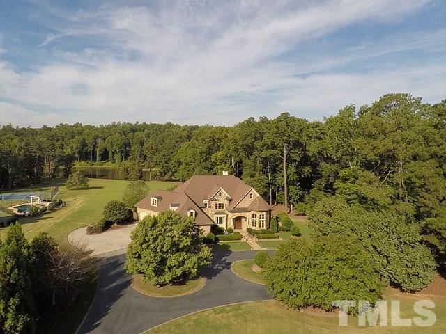 2309 Mt Vernon Church Road Raleigh, NC 27614 - Photo 2 of 25 a view of a lake with a mountain in the background