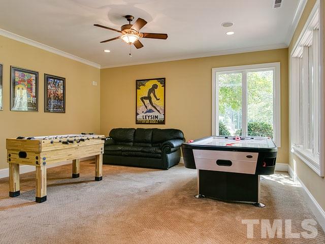 2309 Mt Vernon Church Road Raleigh, NC 27614 - Photo 18 of 25 a living room with furniture stove and large window