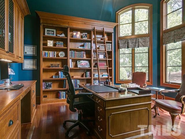 2309 Mt Vernon Church Road Raleigh, NC 27614 - Photo 7 of 25 a view of a workspace with furniture and a window