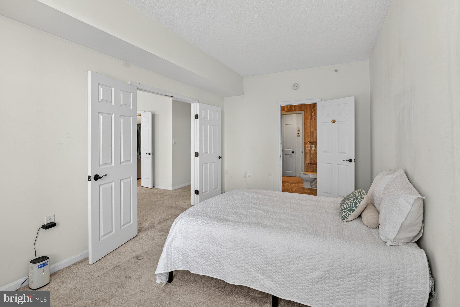 3801 Canterbury Road, Unit 403 Baltimore, MD 21218 - Photo 11 of 25 Bright and airy bedroom retreat.
