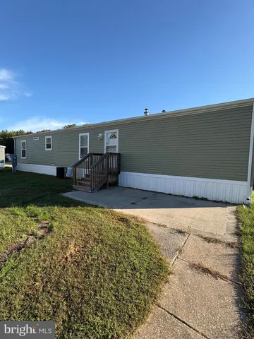 a view of a television with lawn chairs