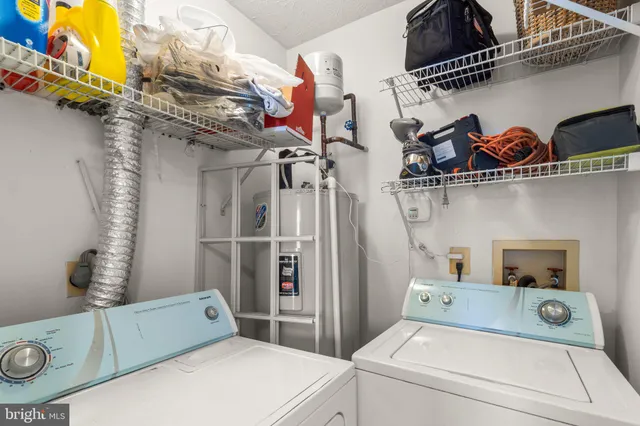 a view of a hallway with wooden door