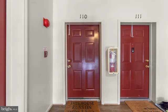 a view of a entryway door front of a house