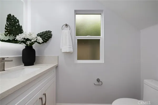 a close view of sink and mirror