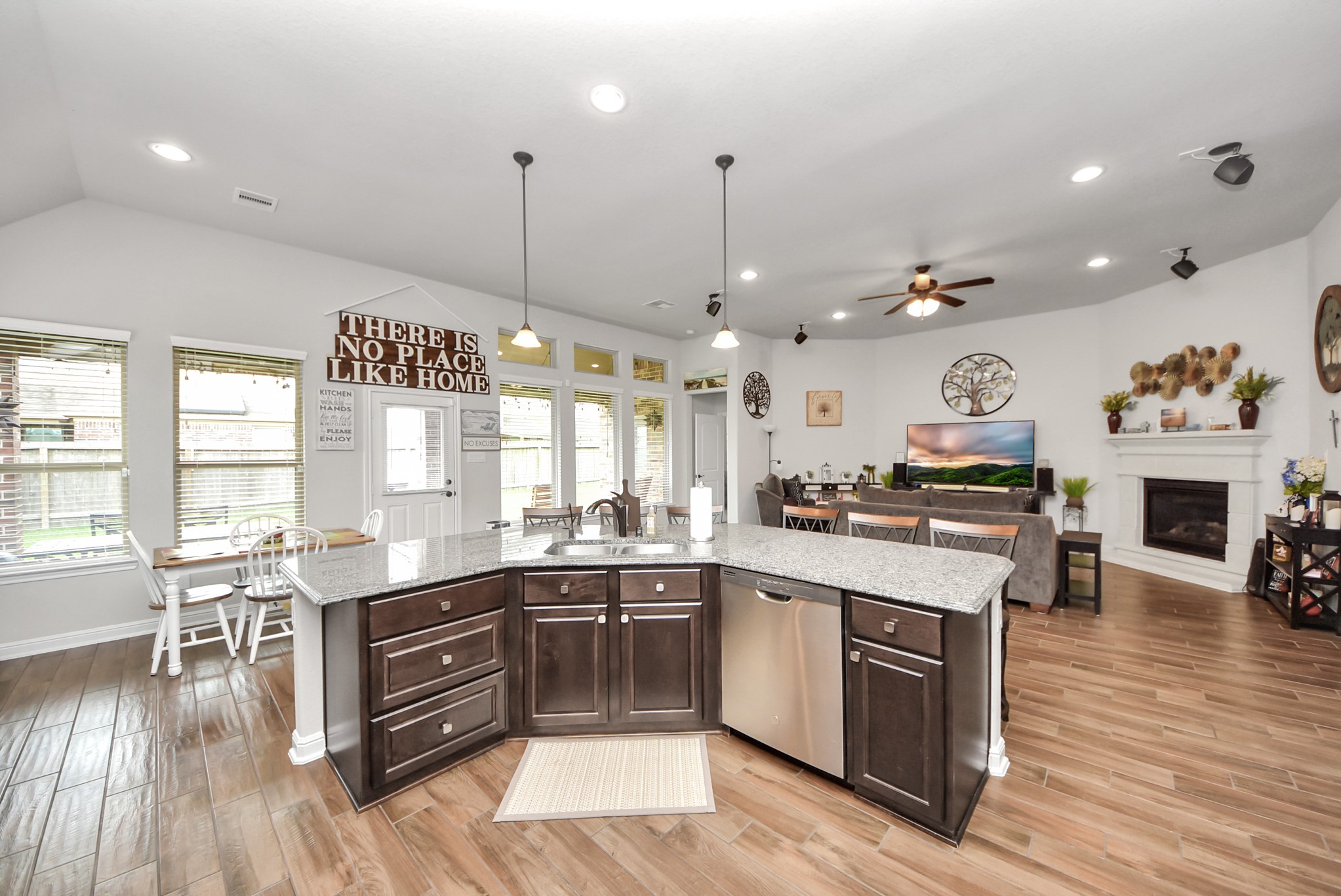 24503 Eucalyptus Way Spring, TX 77373 - Photo 16 of 27 a kitchen with lots of counter top space and dining table