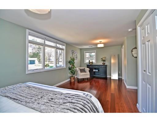 10 Emerson Road Wayland, MA 01778 - Photo 14 of 30 a bedroom with furniture and a wooden floor