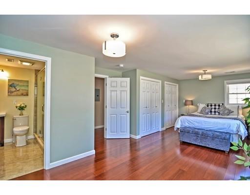 10 Emerson Road Wayland, MA 01778 - Photo 15 of 30 a spacious bedroom with a bed and wooden floor
