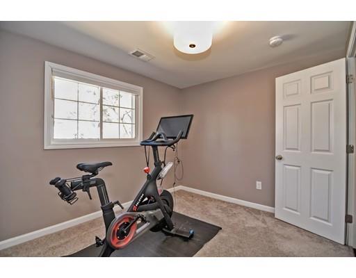 10 Emerson Road Wayland, MA 01778 - Photo 20 of 30 a view of a room with gym equipment