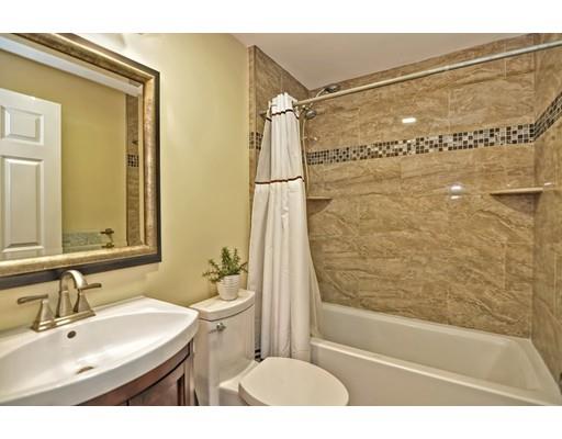 10 Emerson Road Wayland, MA 01778 - Photo 21 of 30 a bathroom with a sink mirror toilet and bathtub