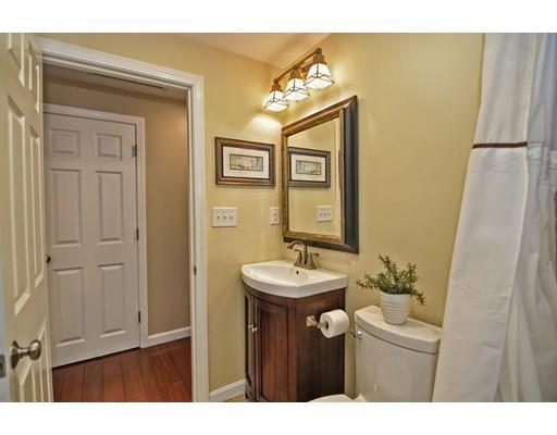 10 Emerson Road Wayland, MA 01778 - Photo 22 of 30 a bathroom with a sink vanity and a mirror