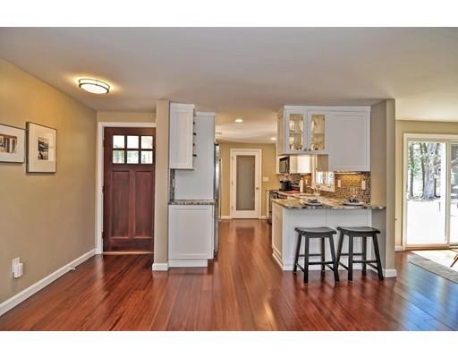 10 Emerson Road Wayland, MA 01778 - Photo 24 of 30 a open kitchen with stainless steel appliances granite countertop a refrigerator and wooden floor