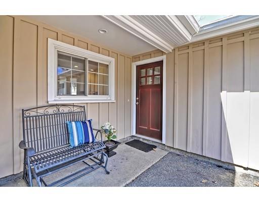 10 Emerson Road Wayland, MA 01778 - Photo 25 of 30 a view of a porch with a bench