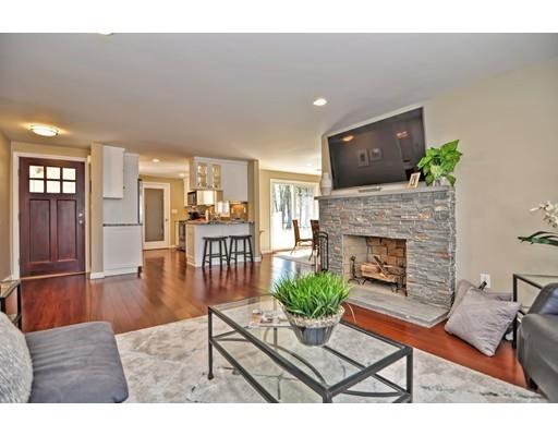 10 Emerson Road Wayland, MA 01778 - Photo 3 of 30 a living room with furniture and a fireplace