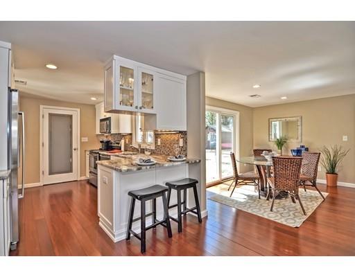 10 Emerson Road Wayland, MA 01778 - Photo 5 of 30 a living room with stainless steel appliances kitchen island granite countertop furniture and wooden floor