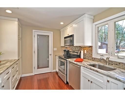 10 Emerson Road Wayland, MA 01778 - Photo 6 of 30 a kitchen with a sink stove top oven and refrigerator