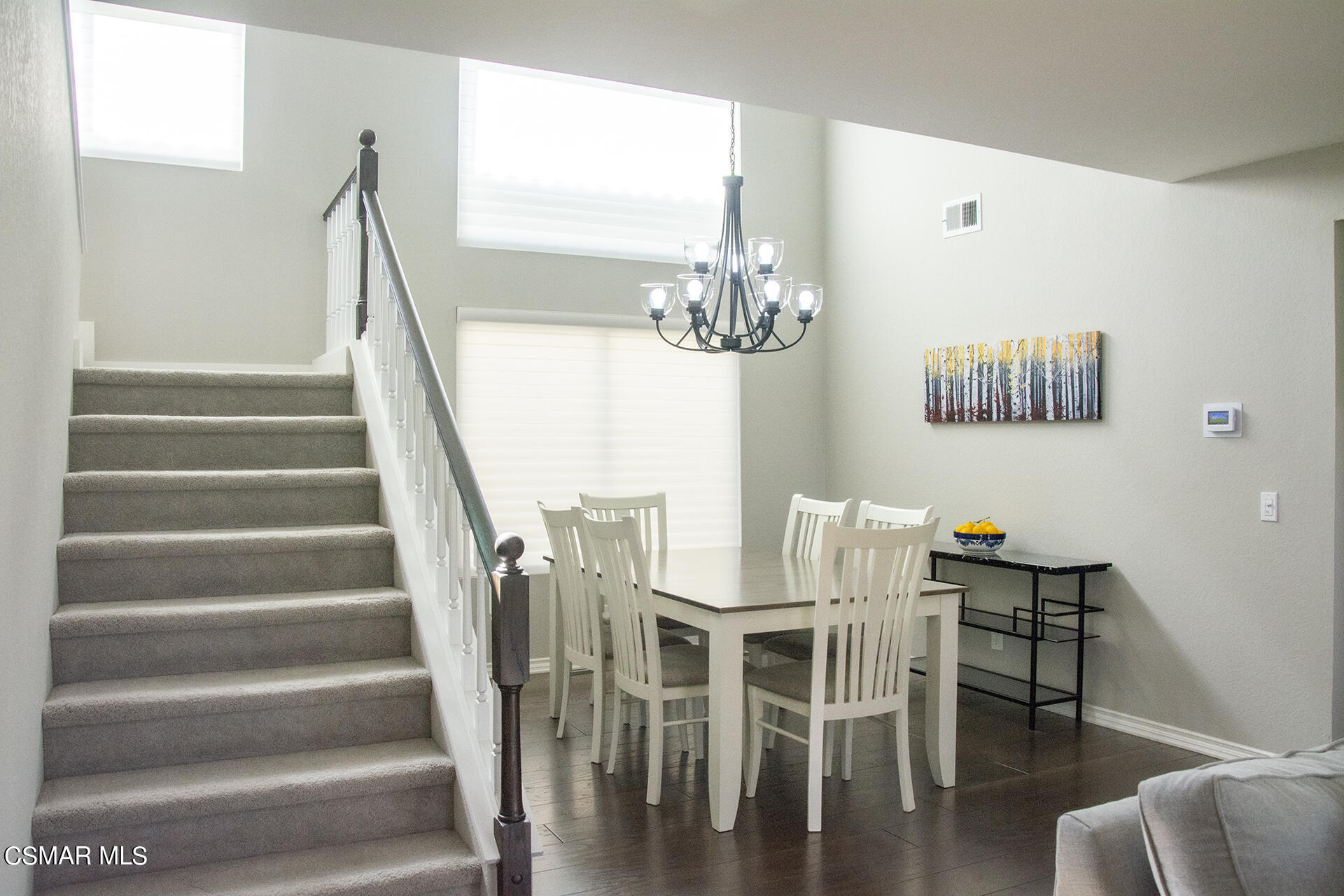685 Overlook Road Simi Valley, CA 93065 - Photo 12 of 37 a view of a dining room with furniture and wooden floor