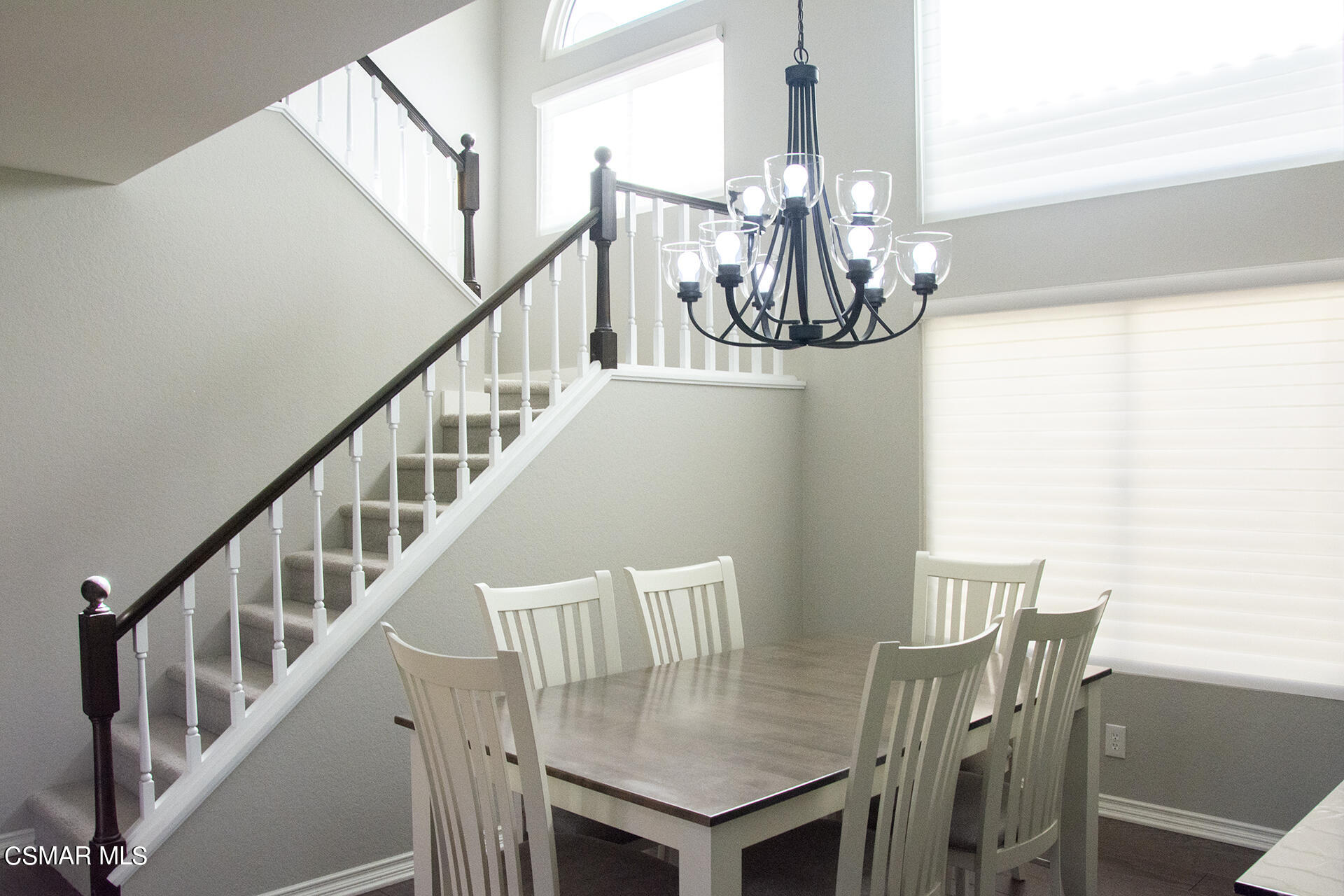 685 Overlook Road Simi Valley, CA 93065 - Photo 13 of 37 a view of a dining room with furniture a chandelier and wooden floor