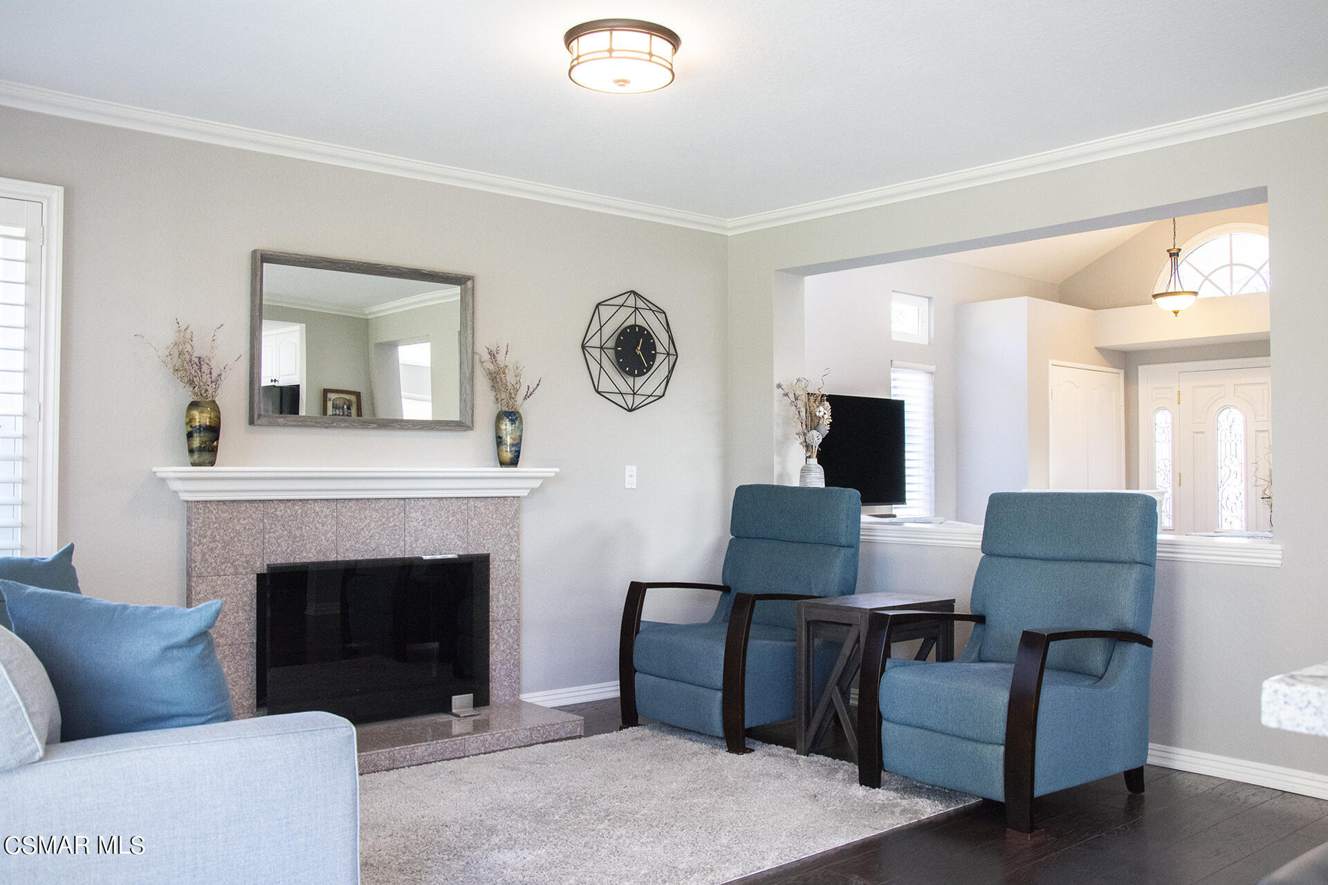 685 Overlook Road Simi Valley, CA 93065 - Photo 24 of 37 a living room with furniture and a fireplace