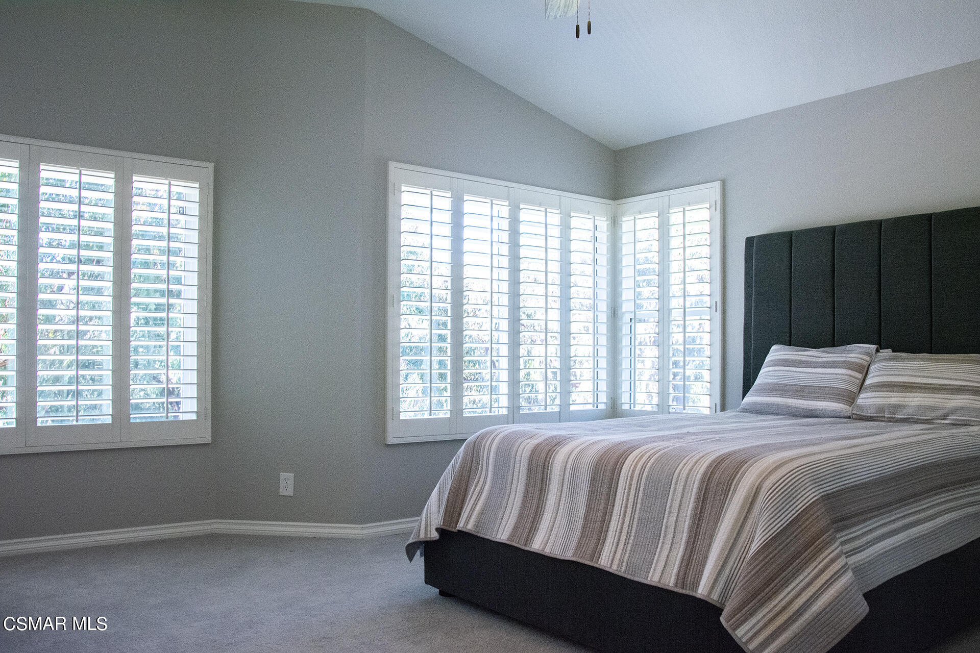 685 Overlook Road Simi Valley, CA 93065 - Photo 26 of 37 a bedroom with a bed and wooden floor