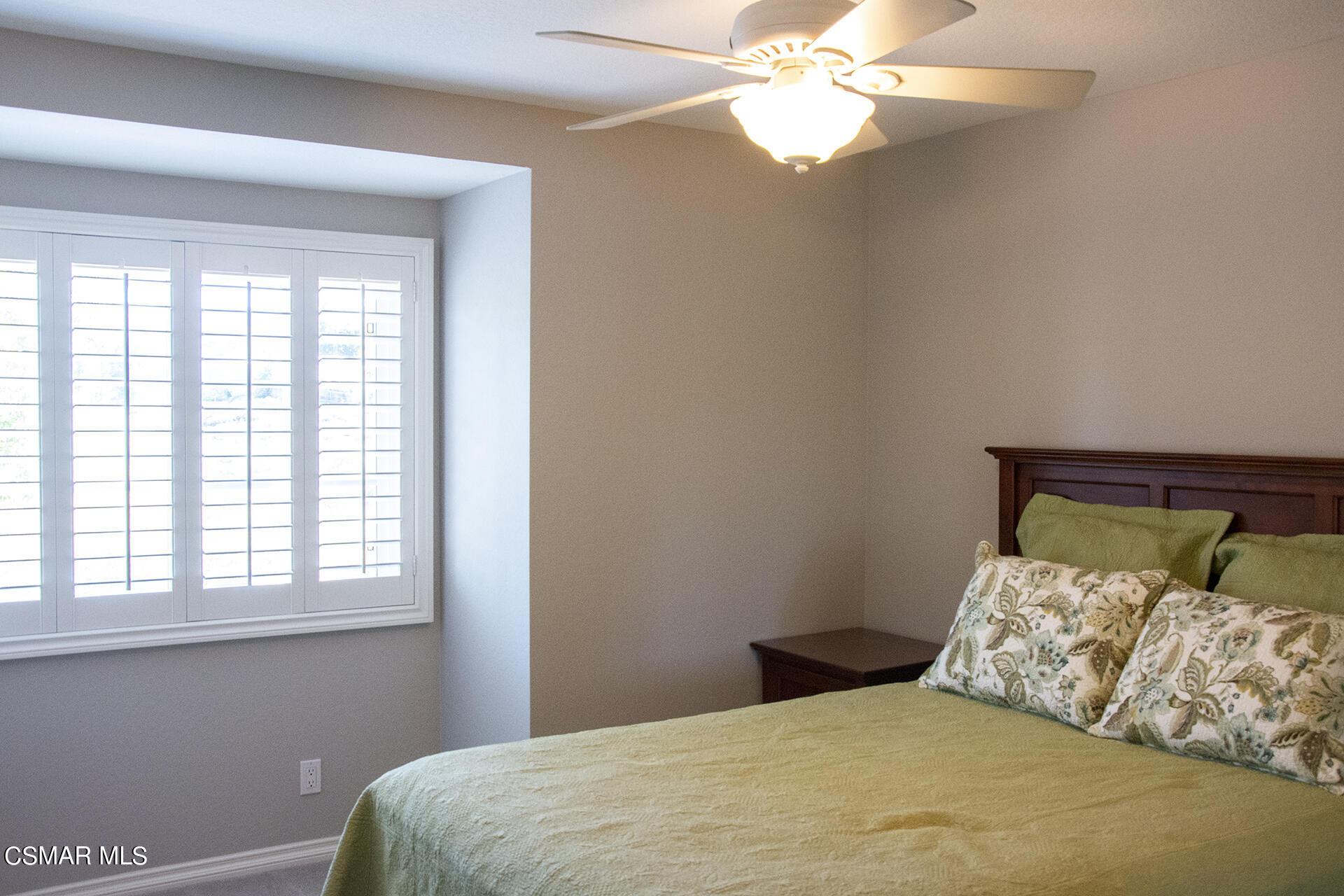 685 Overlook Road Simi Valley, CA 93065 - Photo 32 of 37 a bedroom with a bed and a chandelier