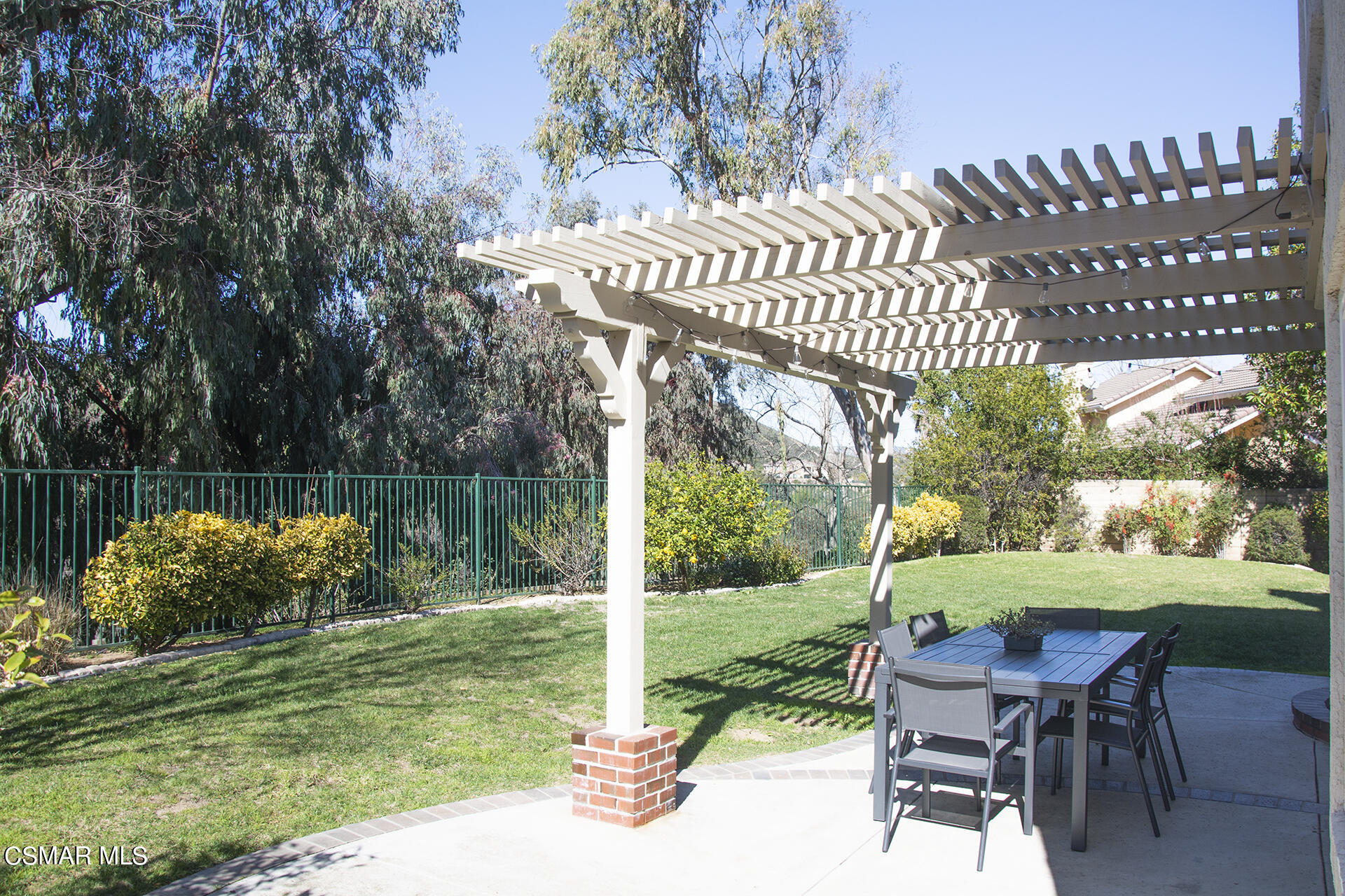 685 Overlook Road Simi Valley, CA 93065 - Photo 5 of 37 a view of a patio with a table chairs and a yard