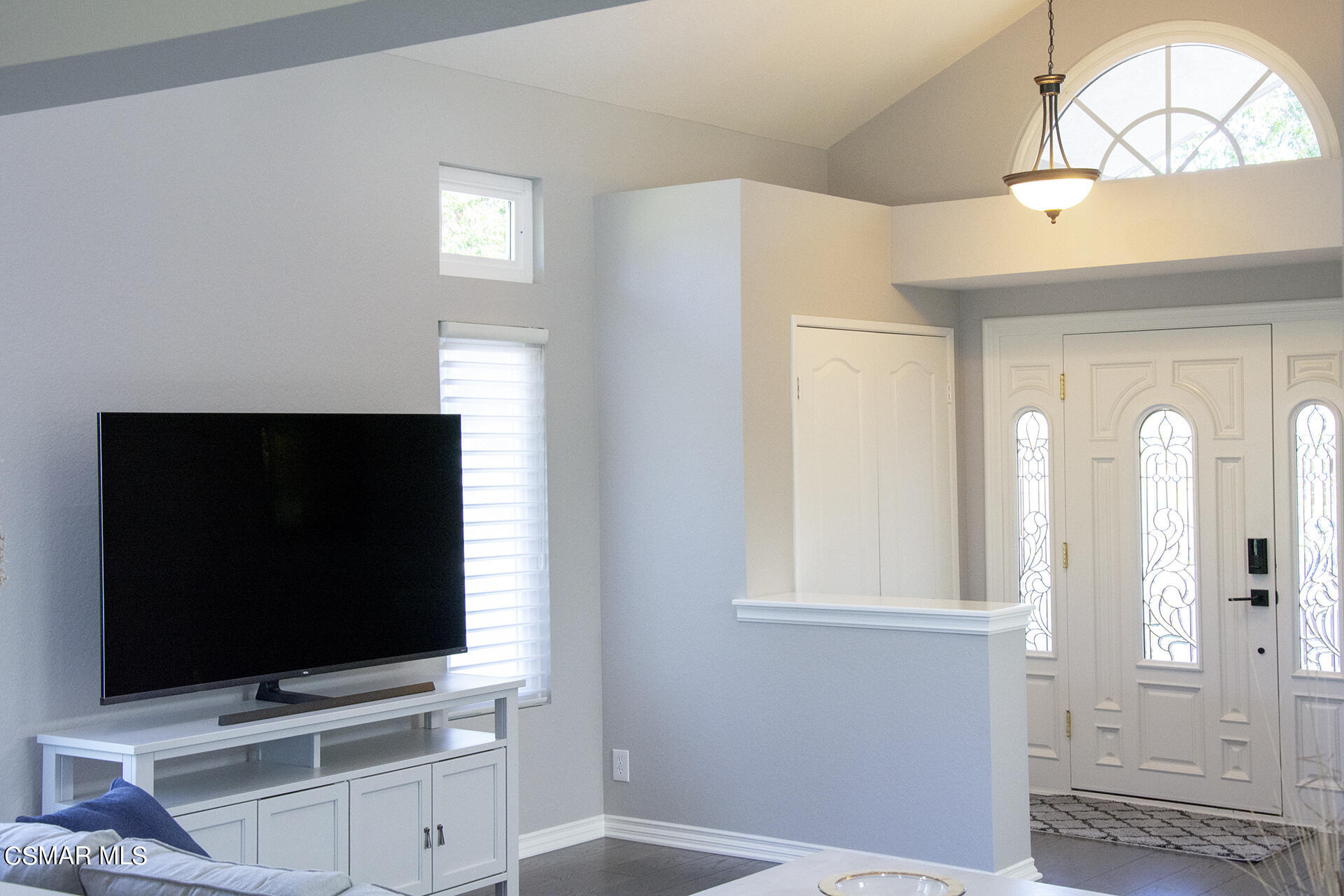 685 Overlook Road Simi Valley, CA 93065 - Photo 10 of 37 a living room with window and a flat screen tv
