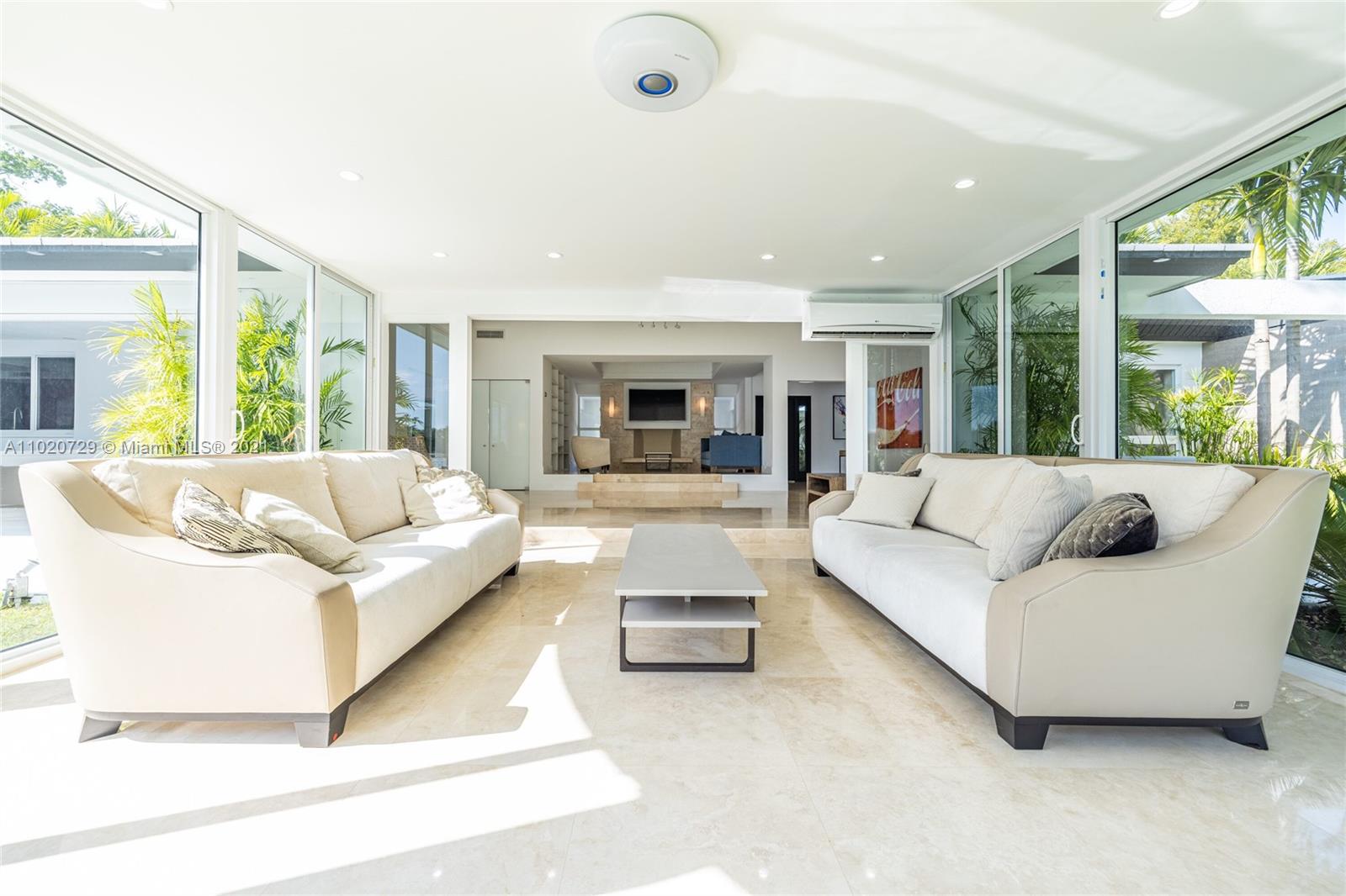 4765 Lake Road Miami, FL 33137 - Photo 35 of 100 a living room with furniture and a large window