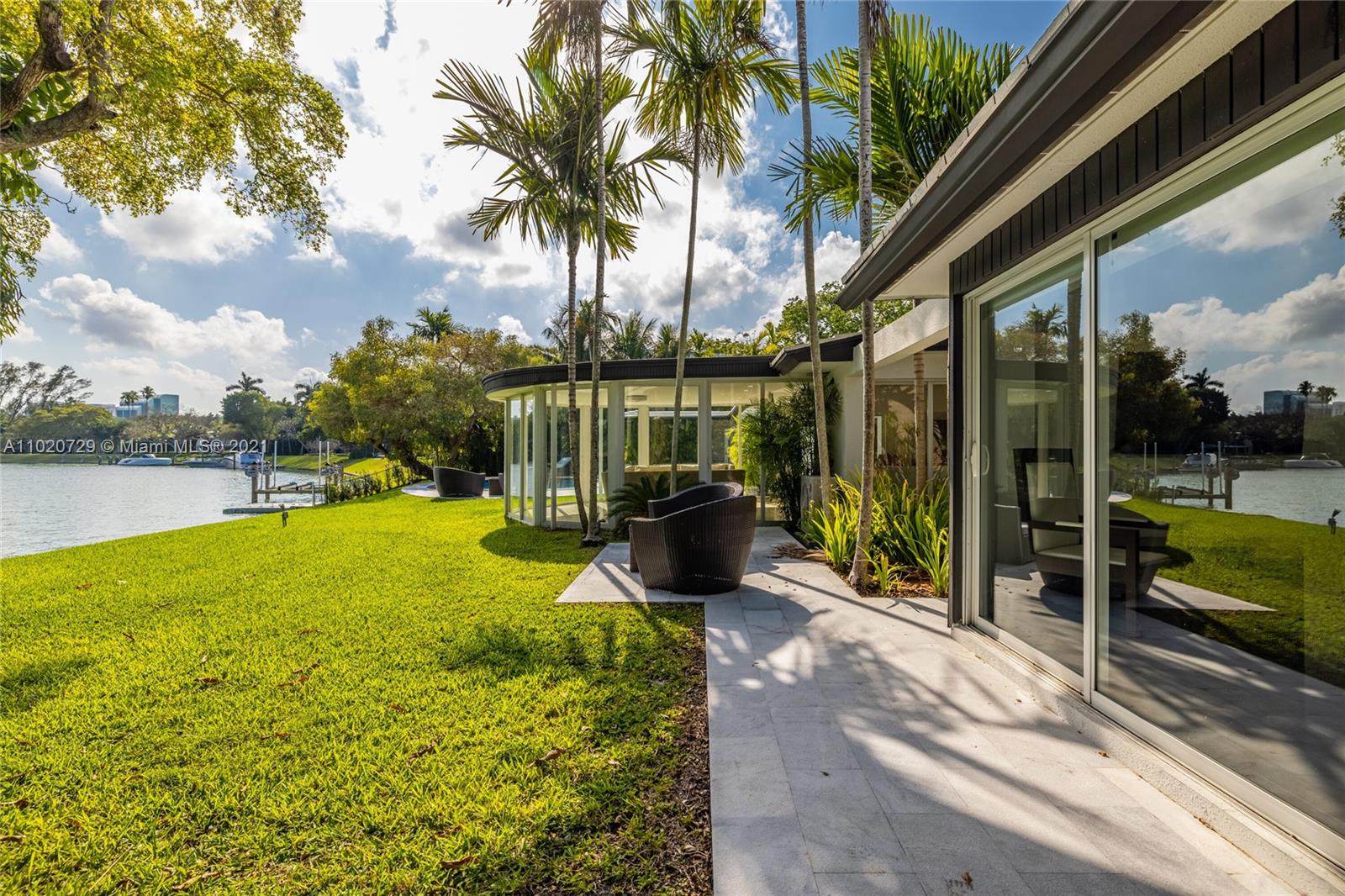 4765 Lake Road Miami, FL 33137 - Photo 66 of 100 a view of a garden with a patio