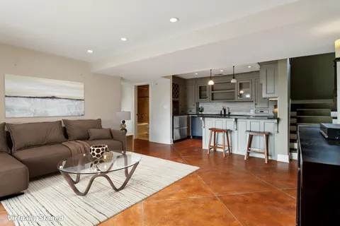 a bedroom with a bed and a desk