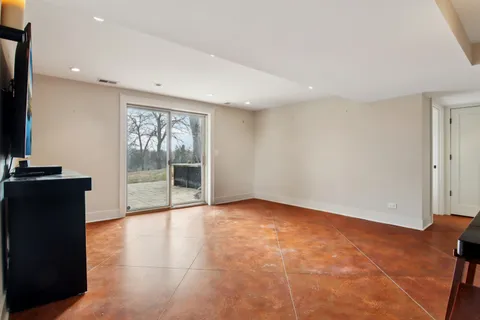 a kitchen with a sink and a refrigerator