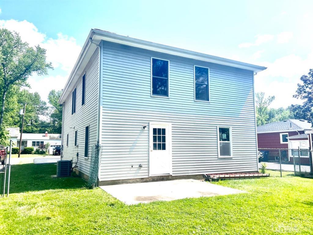 1577 Holly Road North Brunswick, NJ 08902 - Photo 3 of 15 a view of a house with a yard and sitting area