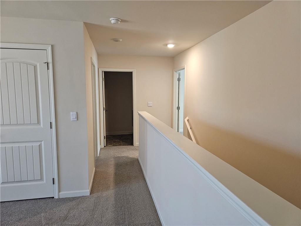 490 Walnut Grv Way Pendergrass, GA 30567 - Photo 14 of 23 a view of hallway with stairs