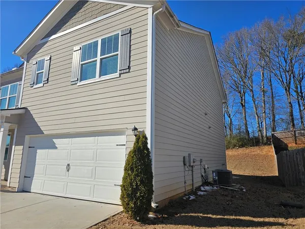 a view of a house with a garage