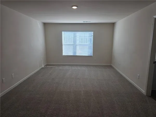 an empty room with a window