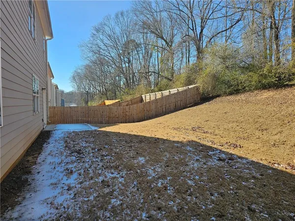 a view of a yard with a snow