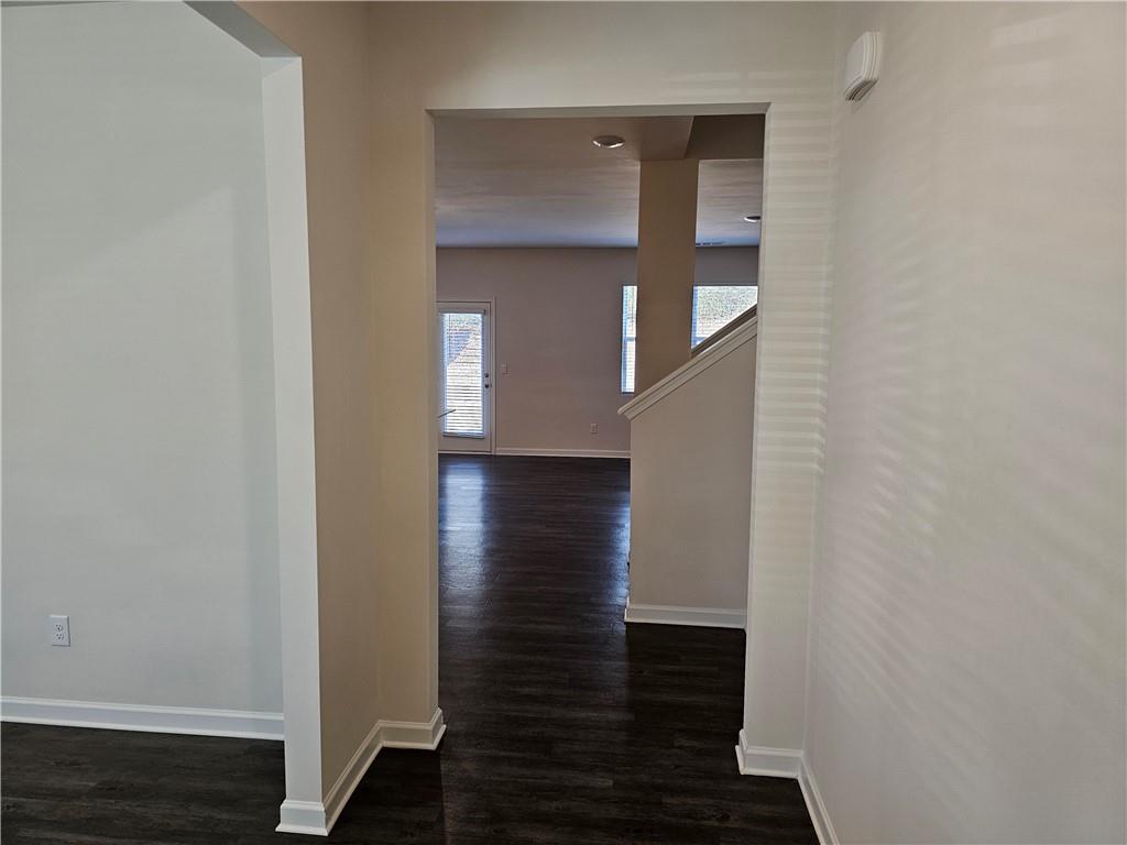 490 Walnut Grv Way Pendergrass, GA 30567 - Photo 4 of 23 a view of hallway with wooden floor