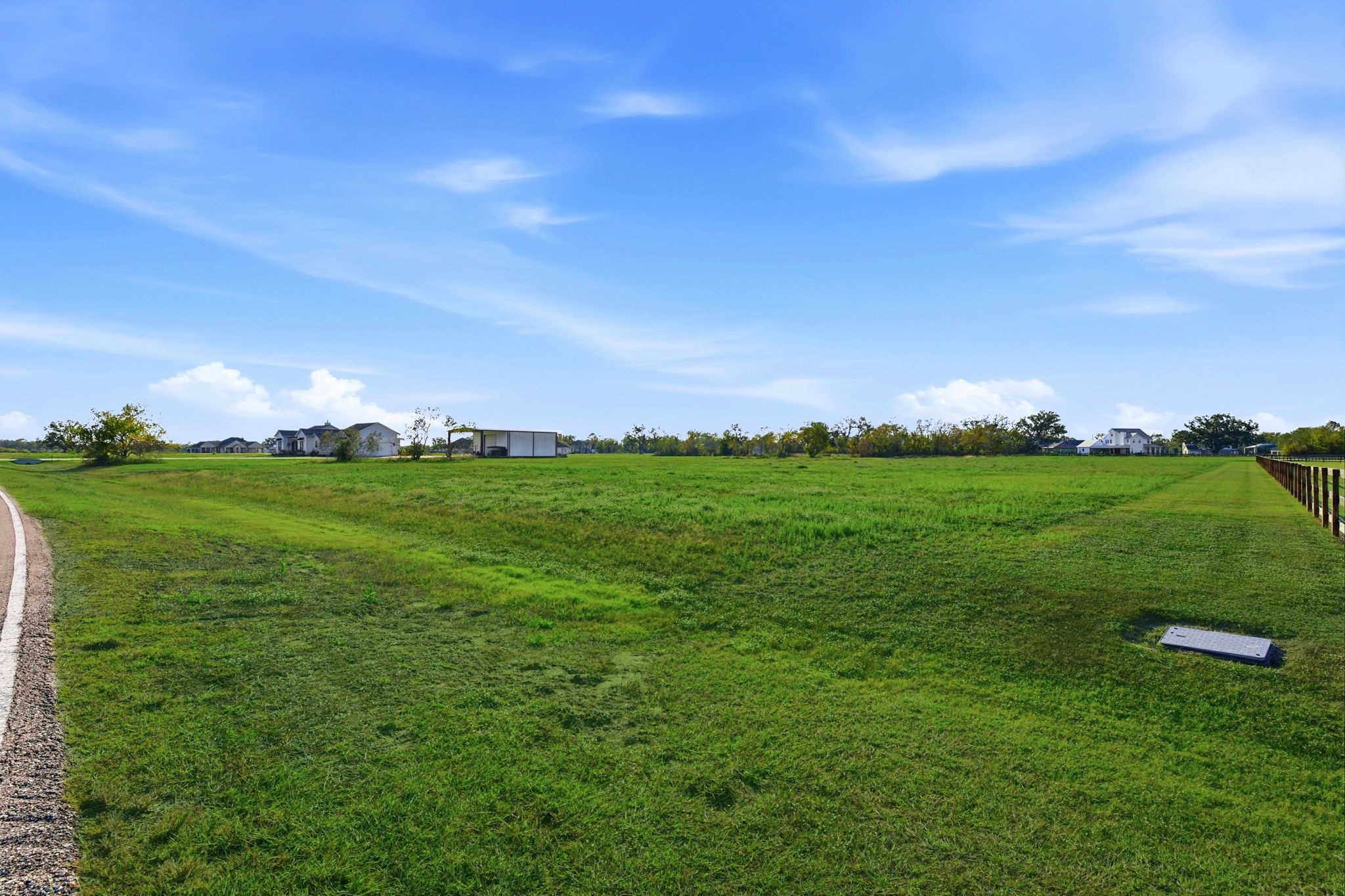22810 Chenango Lake Drive Angleton, TX 77515 - Photo 19 of 21 a view of a grassy field