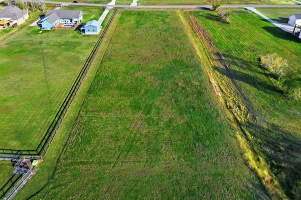 a view of swimming pool from a balcony