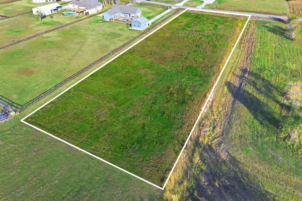a balcony with a yard