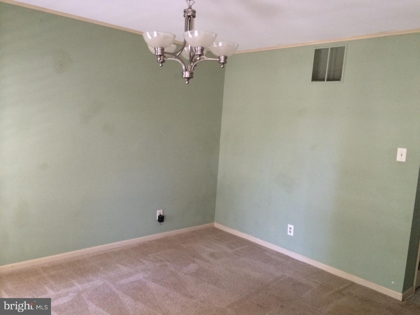 56 Manchester Road Eastampton, NJ 08060 - Photo 2 of 17 a view of a big room with a chandelier fan