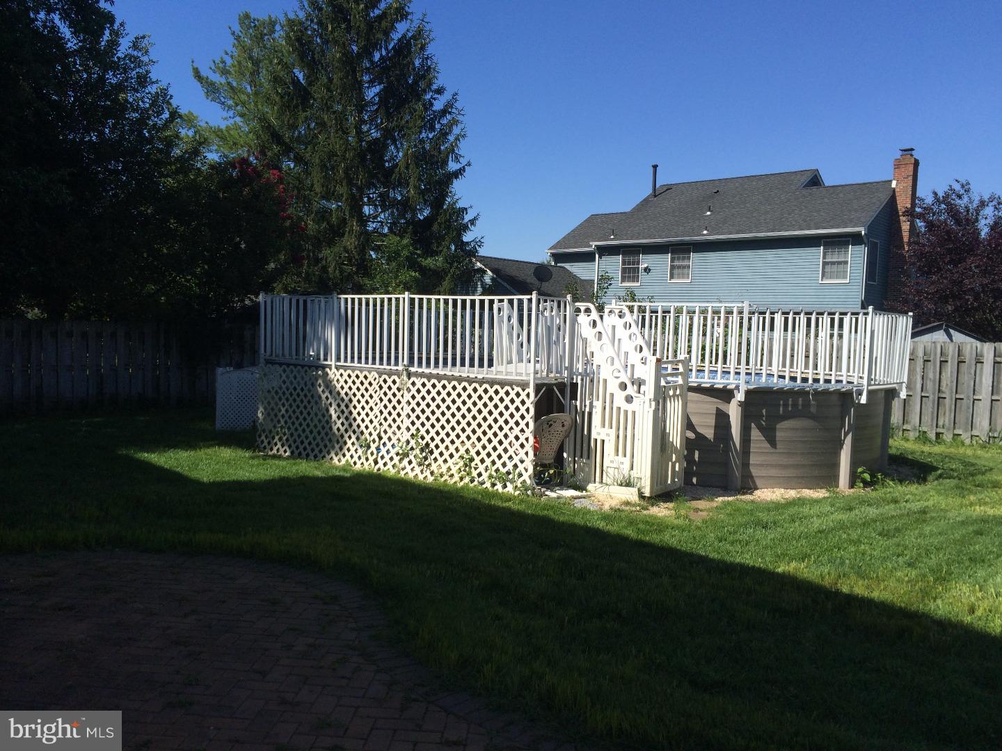 56 Manchester Road Eastampton, NJ 08060 - Photo 14 of 17 a view of a deck with a garden