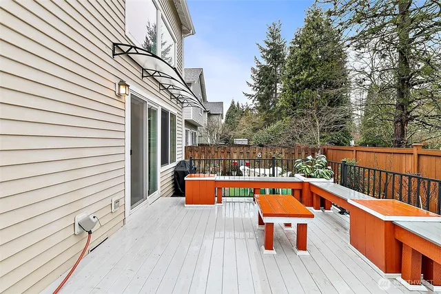 a balcony with an outdoor seating