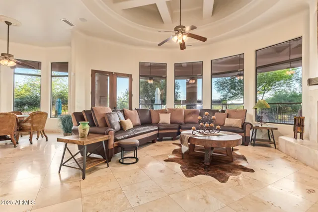 a kitchen with stainless steel appliances granite countertop a kitchen island a stove and a sink